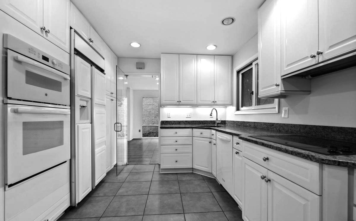Dated galley kitchen before renovation
